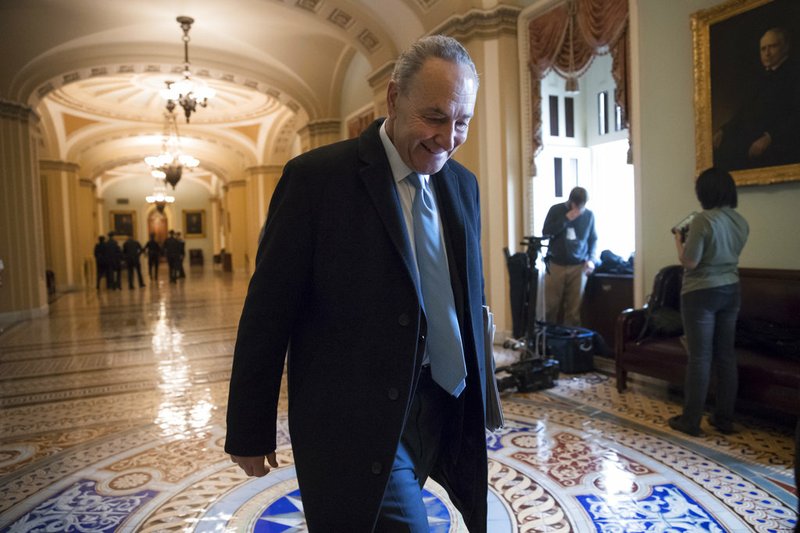 AP Photo/J. Scott Applewhite Senate Minority Leader Chuck Schumer, D-N.Y., arrives at the Capitol at the start of the third day of the government shutdown, in Washington, Monday, Jan. 22, 2018. Schumer, arguably the most powerful Democrat in Washington, is trying to keep his party together to force a spending bill that would include protections for young immigrants.