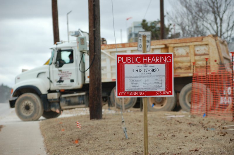 Construction crews go in and out Monday at the site of the future Pinnacle Foods Inc. expansion at 1100 W. 15th St. in Fayetteville. The company will build a 164,000-square-foot frozen goods warehouse connected to its existing building.