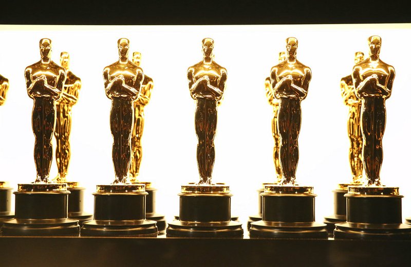 Invision via AP/ Matt Sayles In this Feb. 26, 2017 file photo, Oscar statuettes appear backstage at the Oscars in Los Angeles. Nominations for the 90th Oscars will be announced on Tuesday, Jan. 23, 2018.