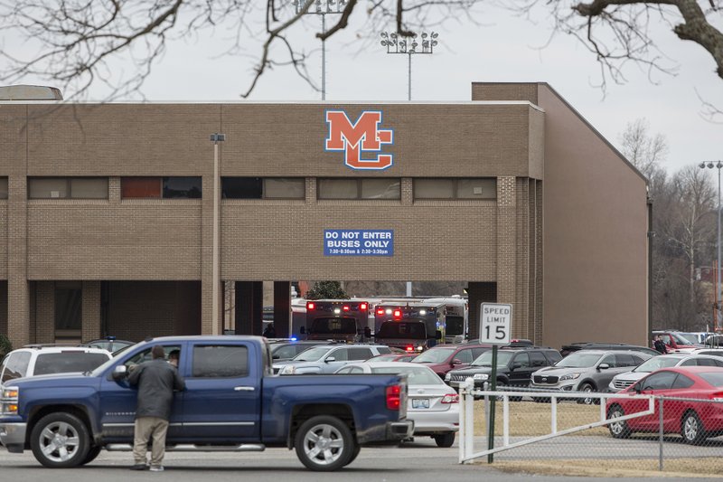 Emergency crews respond to Marshall County High School after a fatal school shooting Tuesday, Jan. 23, 2018, in Benton, Ky. Authorities said a shooting suspect was in custody. (Ryan Hermens/The Paducah Sun via AP)

