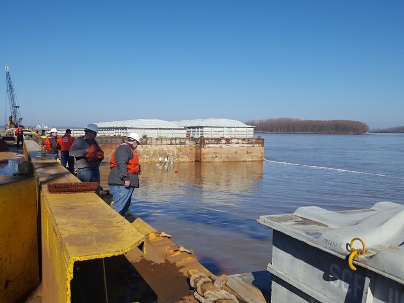 Coast Guard Sector Lower Mississippi River and local agencies are responding to a sunken vessel discharging oil near mile marker 823 on the lower Mississippi River near Blytheville on Jan. 24, 2018. 