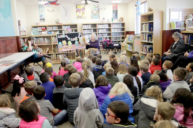 LYNN KUTTER ENTERPRISE-LEADER Sherry Rodgers leads Story Time at Farmington Public Library. Kindergarten classes from Folsom and Williams elementary schools come to her Story Time each week, along with other children in the community.