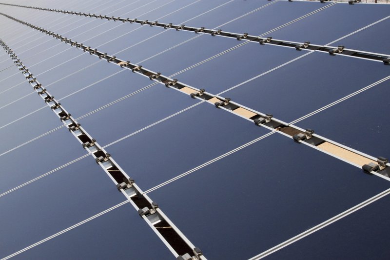 FILE — This April 20, 2011, photo shows some of the 30,000 solar panels that make up the Public Service Company of New Mexico's 2-megawatt photovoltaic array in Albuquerque, N.M.