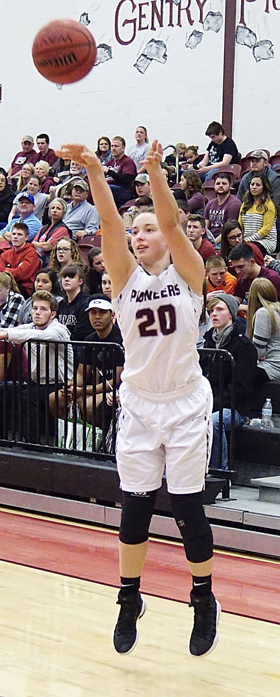 Westside Eagle Observer/RANDY MOLL Kya DeZurik shoots for three from outside during a game in Gentry earlier this season. DeZurik has been an important outside shooter for the Lady Pioneers, often picking up three-pointers.