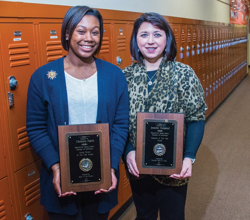 Christine Harris, left, and Jennifer Shnaekel show the plaques they received at the 2018 Malvern/Hot Spring County Chamber of Commerce Awards Banquet. Harris, a senior at Malvern High School, received the Young Person of the Year Award; Shnaekel, Malvern High School principal, received the Educator of the Year Award.