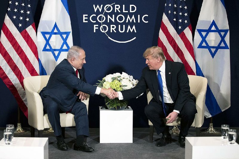 Israeli Prime Minister Benjamin Netanyahu and President Donald Trump meet Thursday at the World Economic Forum in Davos, Switzerland. Trump told Netanyahu that the Palestinians “disrespected us a few weeks ago by not allowing our great vice president” to meet with them. 
