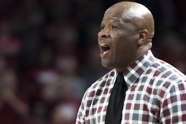 Arkansas coach Mike Anderson talks to his team during a game against Oklahoma State on Saturday, Jan. 27, 2018, in Fayetteville. 