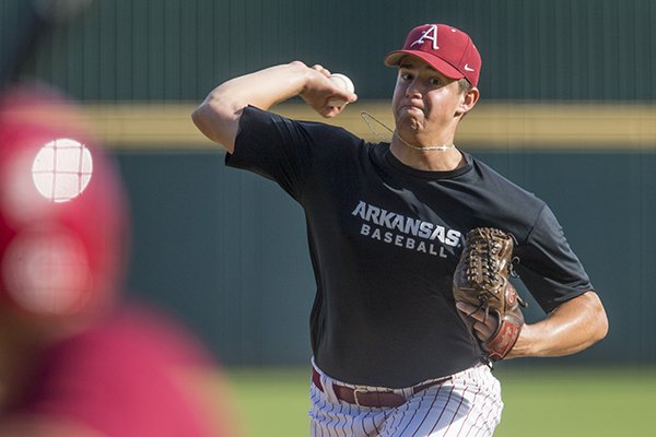 Arkansas pitcher Jackson Rutledge pitches during a scrimmage Wednesday, Oct. 11, 2017, in Fayetteville. 