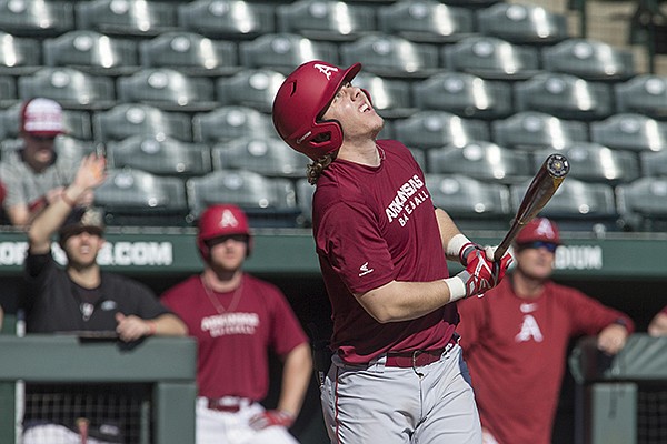 Arkansas outfielder Eric Cole bats during a scrimmage Saturday, Jan. 27, 2018, in Fayetteville. 
