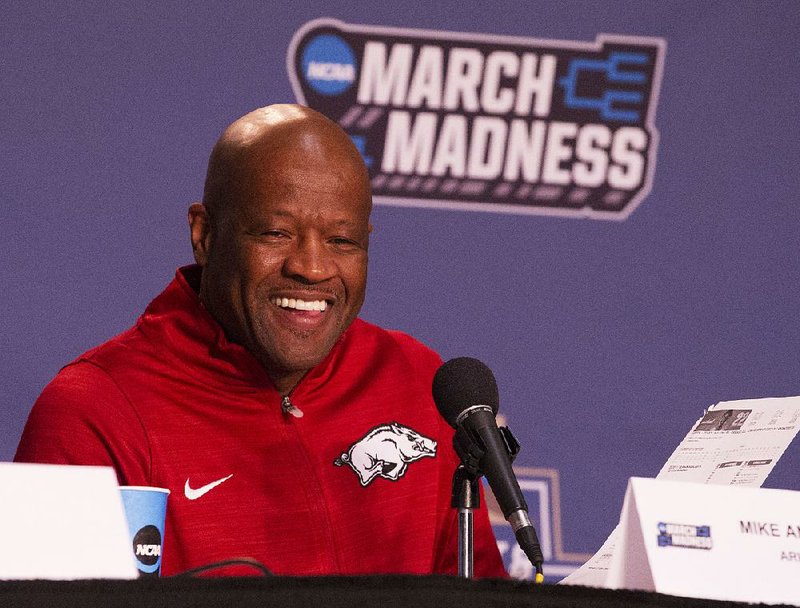 Arkansas' head coach Mike Anderson talks to the press Thursday Mar. 16, 2017 at the Bon Secours Wellness Arena in Greenville, South Carolina. 