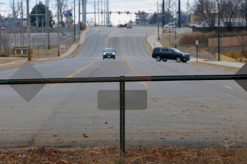 NWA Democrat-Gazette/DAVID GOTTSCHALK A view Tuesday looking south at the end of Gene George Boulevard near the intersection of Bleaux Avenue in Springdale. The extension of the Gene George Boulevard north will be one of the first projects Springdale will begin if a bond issue passes.