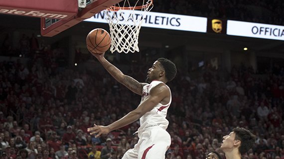 Arkansas Razorbacks guard Daryl Macon (4) reaches for a layup during a basketball game, Saturday, January 27, 2018 at Bud Walton Arena in Fayetteville. Arkansas Razorbacks beat the Oklahoma State Cowboys 66-65.