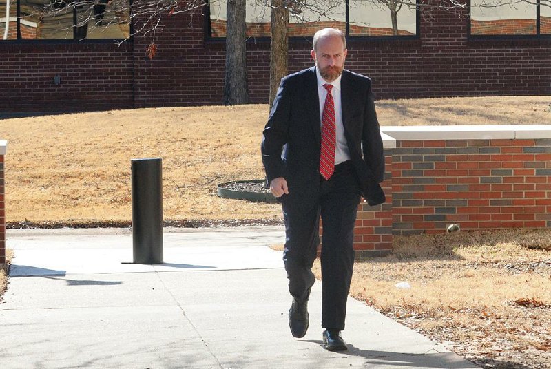 Jake Files, a Republican state senator representing District 8, walks Monday into the Judge Isaac C. Parker Federal Building in Fort Smith, where he pleaded guilty to charges of wire fraud, bank fraud and money laundering.