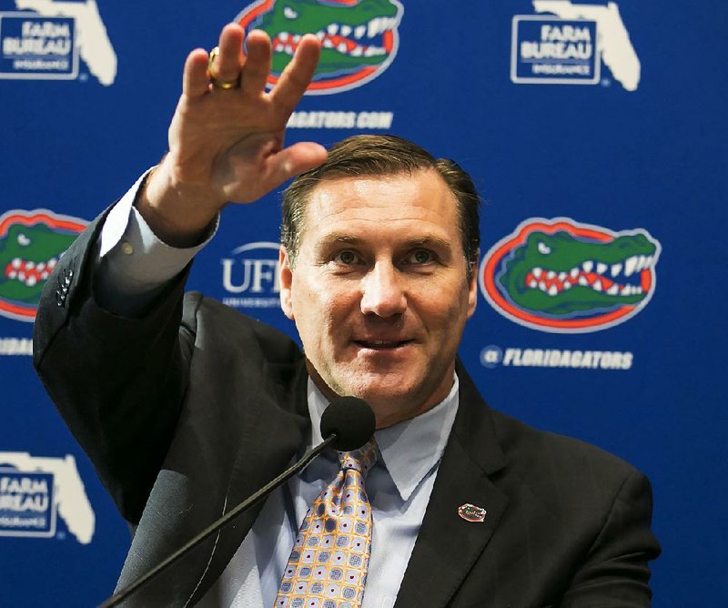 Despite finishing with a 4-7 record a year ago and having two losing seasons in the past five years, new Florida
football Coach Dan Mullen told fans at Saturday’s basketball game that the standard at Florida is winning SEC and national championships. Mullen was the offensive coordinator at Florida when the Gators won national championships in 2006 and 2008.