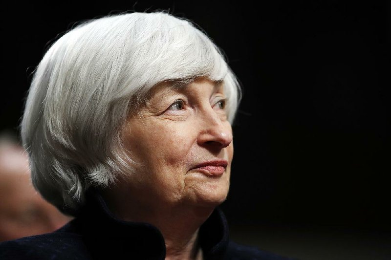 In this Tuesday, Nov. 7, 2017, file photo, Federal Reserve Chair Janet Yellen listens to introductions as she is awarded the Paul H. Douglas Award for Ethics in Government, on Capitol Hill in Washington. 