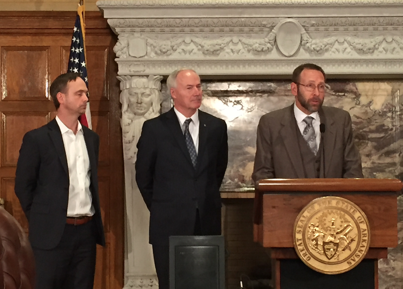 From left, Arkansas surgeon general Adam Bledsoe, Gov. Asa Hutchinson and Arkansas Department of Health Director Nathaniel Smith speak during a news conference Tuesday, Jan. 30, 2018, at the state Capitol.