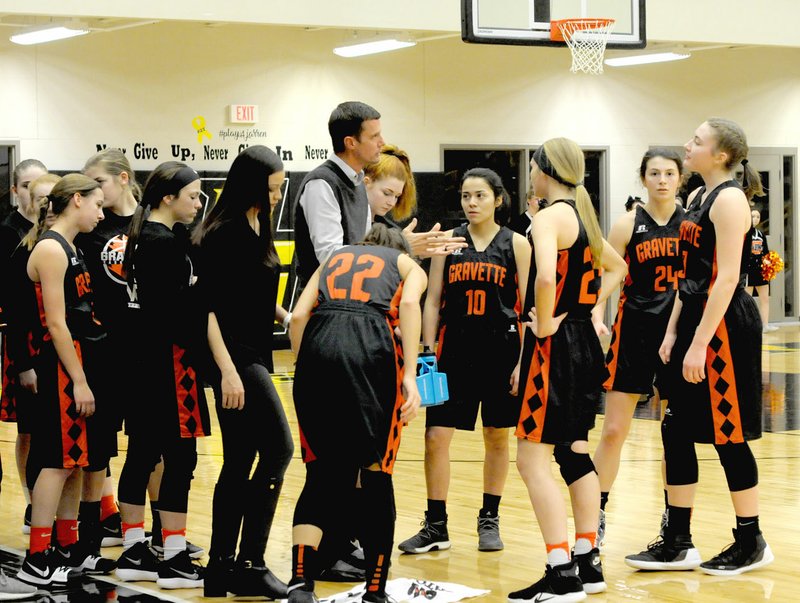 Westside Eagle Observer/MARK HUMPHREY Gravette coach Will Pittman explains tactics to the Lady Lions' basketball squad during a timeout. Pittman has guided the Lady Lions to a 16-5 record as of Thursday, including a 53-37 conference win over Lincoln in a rescheduled game played on Jan. 20.