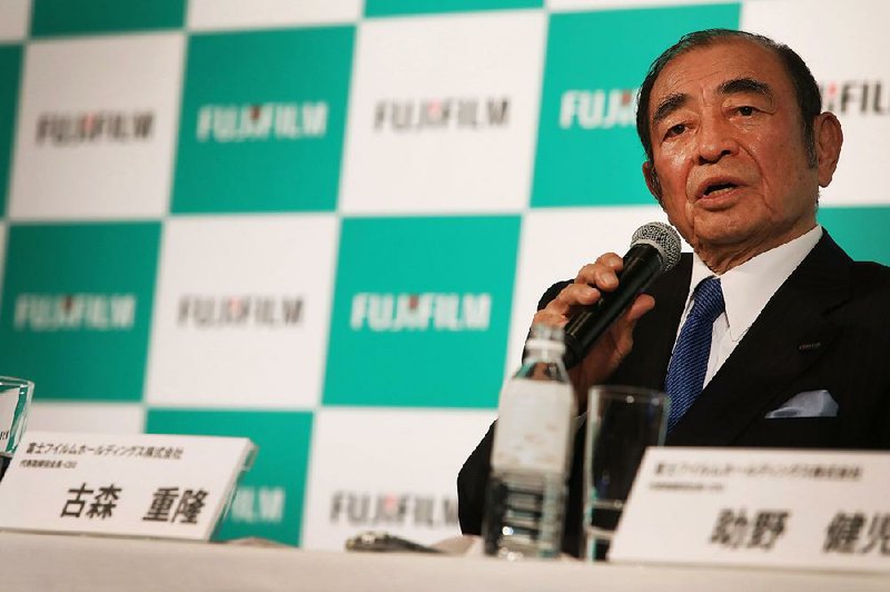 Shigetaka Komori, chief executive officer of Fujifilm Holdings Corp., speaks Wednesday during a news conference in Tokyo, where the Xerox Corp. deal was announced. 