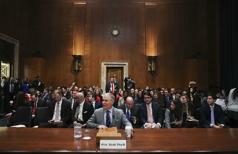 EPA Administrator Scott Pruitt testifies Tuesday before the Senate Environment Committee. 