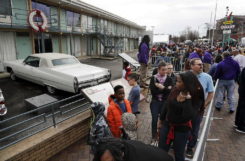 People wait in line to enter the National Civil Rights Museum in Memphis. The site is among about 130 locations
in 14 states being promoted as part of the new U.S. Civil Rights Trail.