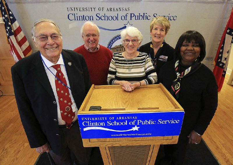 Clinton School of Public Service volunteers (left to right) Don Castleberry, Bob Gee, Jeanne McDaniel, Ann Hedges and Brenda McKeever are some of the hundreds of helpers who keep the school and the Clinton Presidential Center operating.