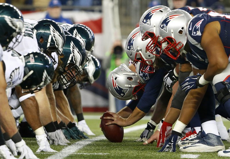 Associated Press HEAD TO HEAD: In this Dec. 6, 2015, file photo, the New England Patriots, right, and the Philadelphia Eagles get set for the snap at the line of scrimmage at Gillette Stadium in Foxborough, Mass. The two teams are set to meet in Super Bowl 52 on Sunday in Minneapolis.
