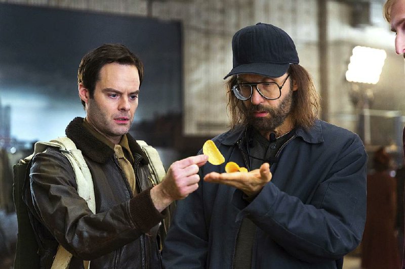 A Pringles ad for the Super Bowl broadcast on Sunday features actors Bill Hader (left) and Sky Elobar. Marketers are paying more than $5 million per 30-second spot, with commercials mostly steering clear of politics.