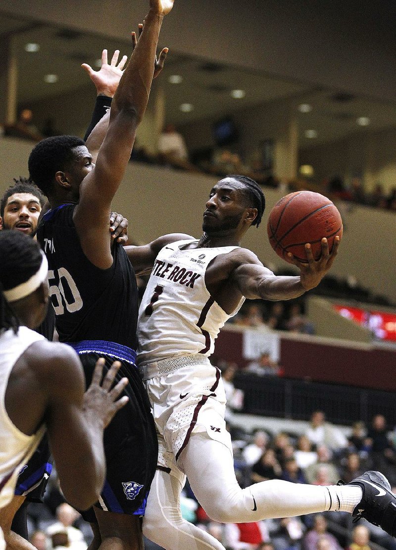 UALR’s Andre Jones  (1) had 7 points and 2 rebounds in the Trojans’ 81-51 loss to Georgia State on Saturday night at the Jack Stephens Center in Little Rock.