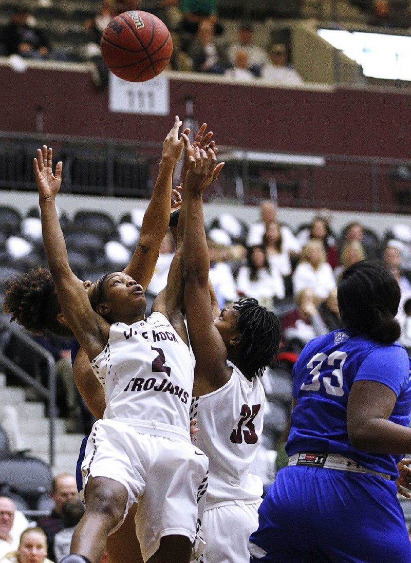 UALR’s Monique Townson (2) had six rebounds and Keanna Keys (33) had eight rebounds in the Trojans’ 54-47 victory over Georgia State on Saturday at the Jack Stephens Center in Little Rock. As a team, UALR outrebounded Georgia State 42-28.