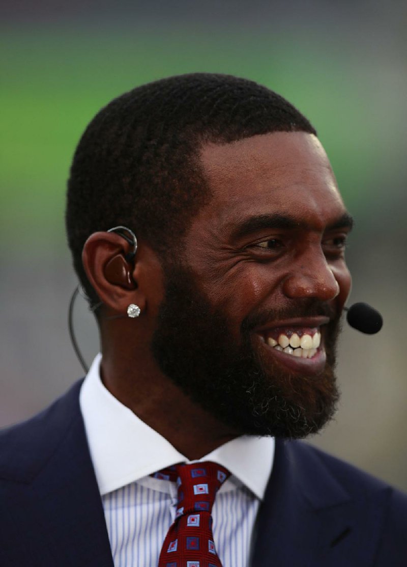 ESPN reporter and former NFL star Randy Moss on set before the NFL Pro Bowl football game Sunday, Jan. 28, 2018, in Orlando, Fla. The AFC won 24-23. 