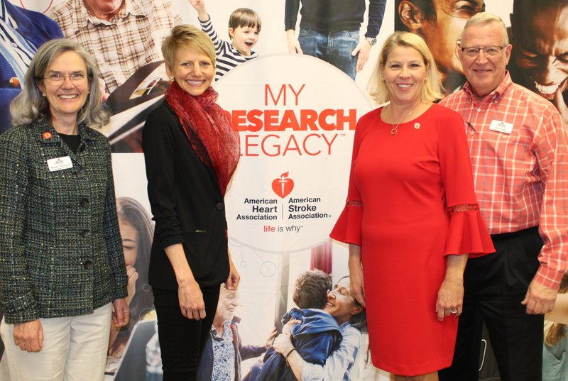 NWA Democrat-Gazette/CARIN SCHOPPMEYER Dr. Margaret Tremwell (from left), Dr. Jennifer Hall, chief of the American Heart Association Institute for Precision Cardiovascular Medicine, and Suzy and Chuck Fehlig gather at a supporter forum Thursday at Advantage Solutions in Rogers.