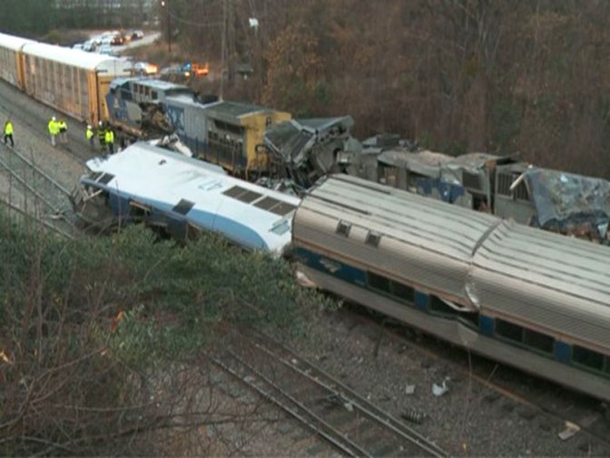 In this image from video, train cars are smashed and derailed Sunday, Feb. 4, 2018 near Cayce. S.C. The crash left multiple people dead and dozens of people injured. 