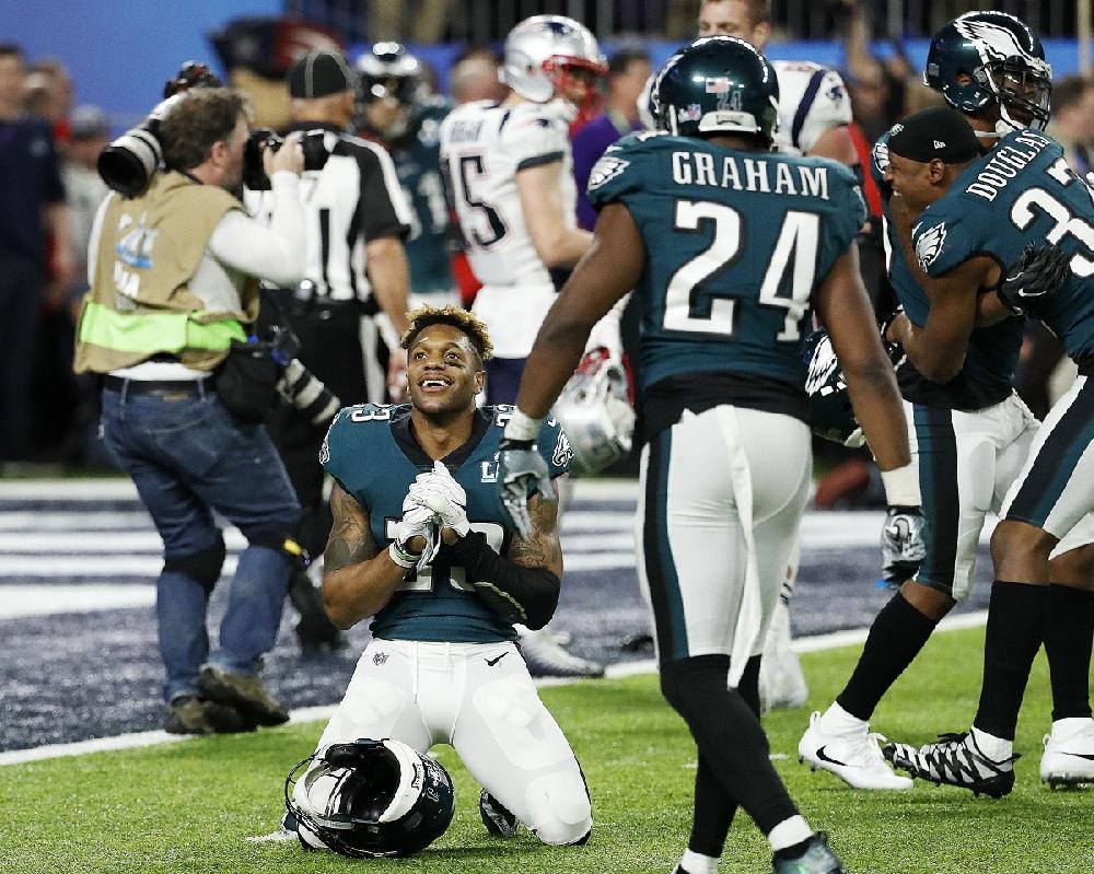 New England Patriots' Brandin Cooks, left, is stopped by Philadelphia  Eagles' Rodney McLeod during the first half of the NFL Super Bowl 52  football game Sunday, Feb. 4, 2018, in Minneapolis. (AP