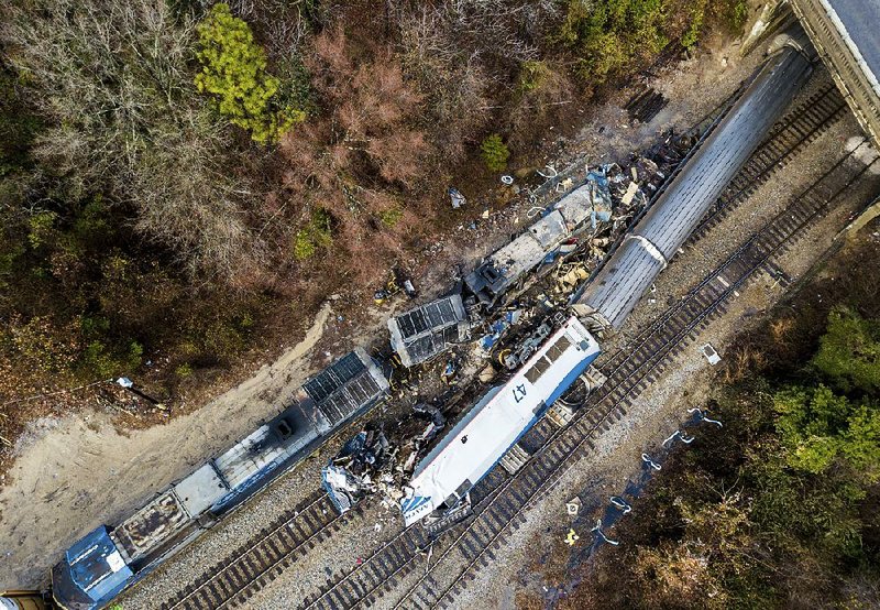 The site where an Amtrak train crashed into a parked freight train is seen from above Sunday in Cayce, S.C.