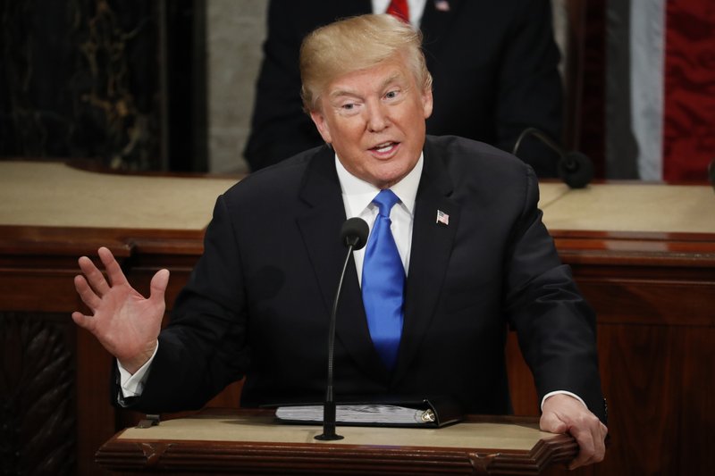 FIlE - In this Jan. 30, 2018 file photo, President Donald Trump delivers his State of the Union address to a joint session of Congress on Capitol Hill in Washington. It's beginning to look like Congress' election-year battle over immigration could end up in stalemate or a narrowly focused bill. The kind of broader measure that Trump has proposed is running into trouble. The reasons: Deep gaps between the two parties, internal divisions particularly among Republicans and political incentives that might leave each side content with a minimal compromise or even nothing at all.(AP Photo/Pablo Martinez Monsivais)