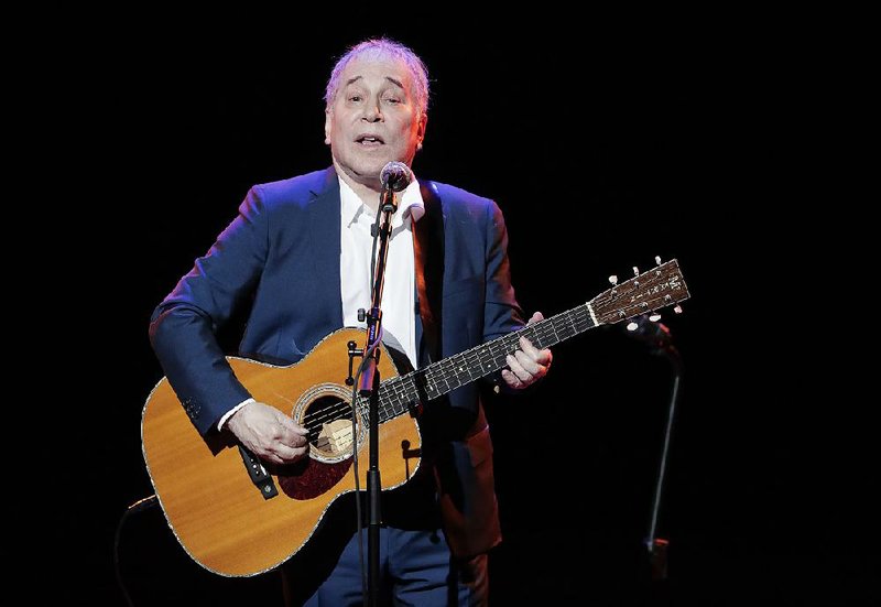 In a Sept. 22, 2016 file photo, musician Paul Simon performs during the Global Citizen Festival, in New York. On Monday, Feb. 5, 2018, Simon took to social media to say his upcoming tour will be his last, citing the personal toll of touring and the death of his lead guitarist, Vincent N'guini. (AP Photo/Julie Jacobson, File)