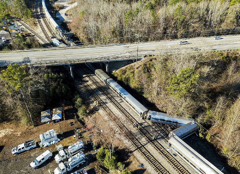 This aerial view shows the scene of Sunday’s train crash between an Amtrak train (bottom) and a CSX freight train (top left) in Cayce, S.C.