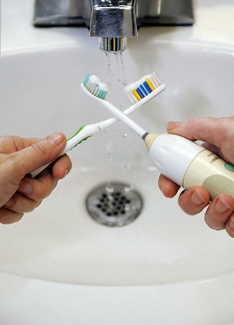 Brush off: Separate sick family members’ toothbrushes to avoid the spread of germs.