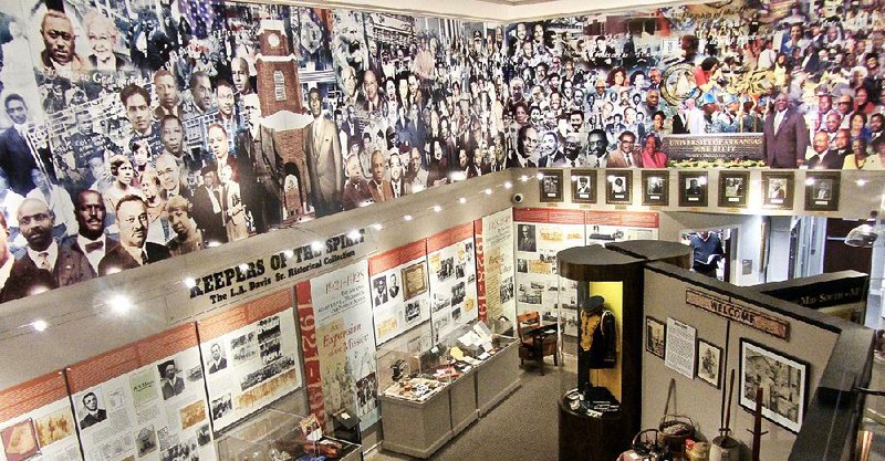 A large mural picturing figures related to the history of the University of Arkansas at Pine Bluff dominates the school’s University Museum and Cultural Center.