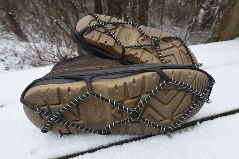 NWA Democrat-Gazette/FLIP PUTTHOFF Ice grippers, such as Yaktrax, provide traction when walking on snow and ice. These were photographed after a walk in the snow in mid-January.