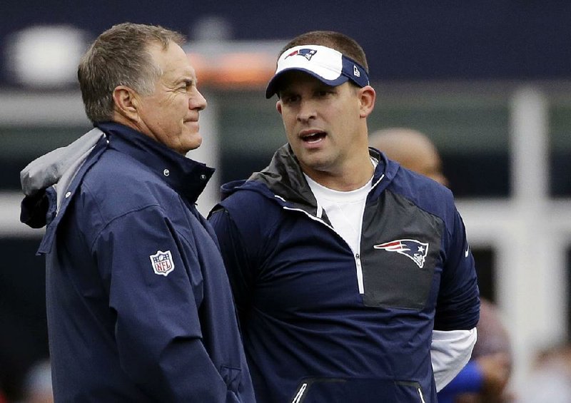 New England Patriots offensive coordinator Josh McDaniels (right) backed out of a deal Tuesday to become the Indianapolis Colts’ head coach. McDaniels will return to Coach Bill Belichick’s staff.
