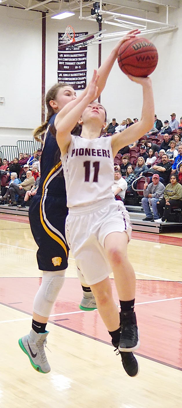 Westside Eagle Observer/RANDY MOLL Gentry sophomore Ahrya Reding attempts a shot against Haas Hall during Jan. 30 play at Gentry High School.