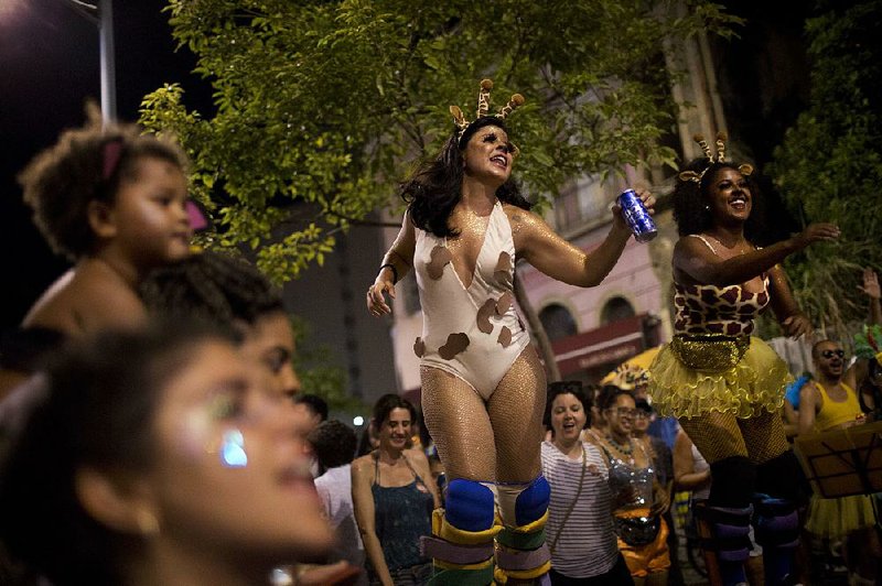 Brazilians in animal costumes take part in a women-focused block party over the weekend in Rio de Janeiro. 
