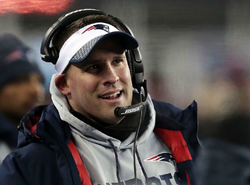 New England Patriots offensive coordinator Josh McDaniels watches from the sideline during the second half of an NFL divisional playoff football game against the Tennessee Titans, Saturday, Jan. 13, 2018, in Foxborough, Mass. 