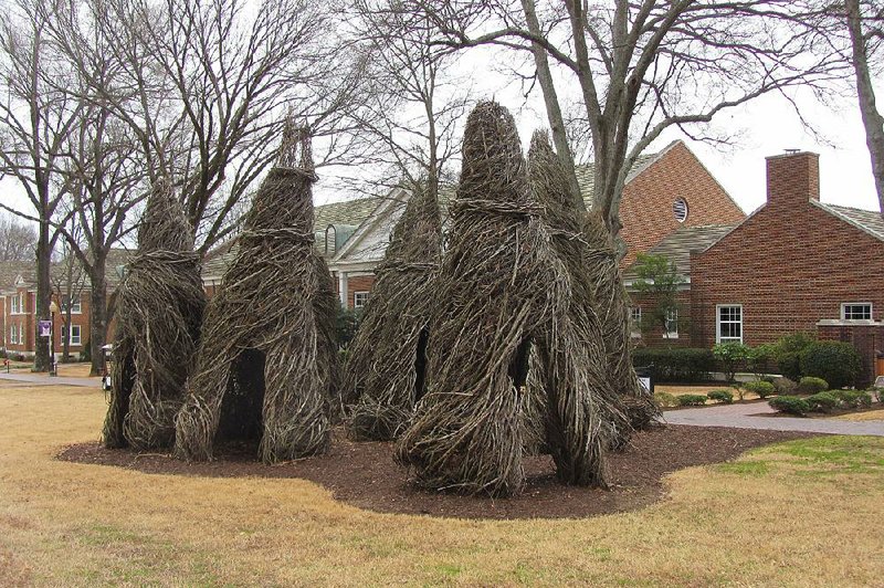 Patrick Dougherty’s large-scale installation, The Big Naturals, stands outside Baum Gallery at the University of Central Arkansas in Conway. 