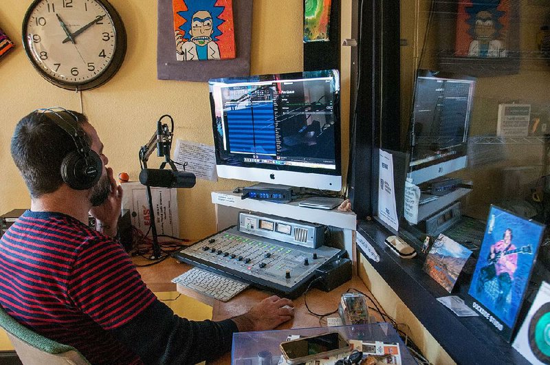 Low Key Arts Executive Director Sonny Kay mans the mic during his show The Bassics on Hot Springs’ solar-powered, low-wattage FM station KUHS.