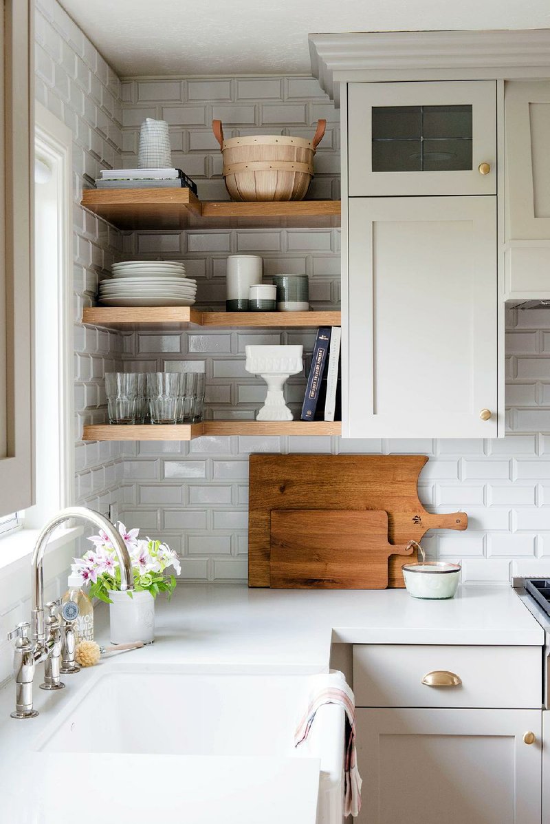 Studio McGee suggests adding dimension to standard subway tile by using ceramic tile with a beveled edge, such as Ice White Beveled Subway Tile from Mission Stone & Tile.