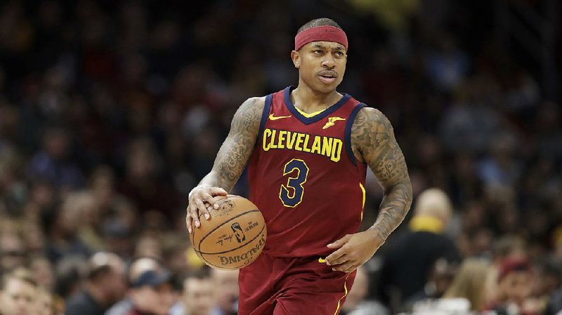 Cleveland Cavaliers' Isaiah Thomas drives against the Detroit Pistons in the first half of an NBA basketball game, Sunday, Jan. 28, 2018, in Cleveland. 