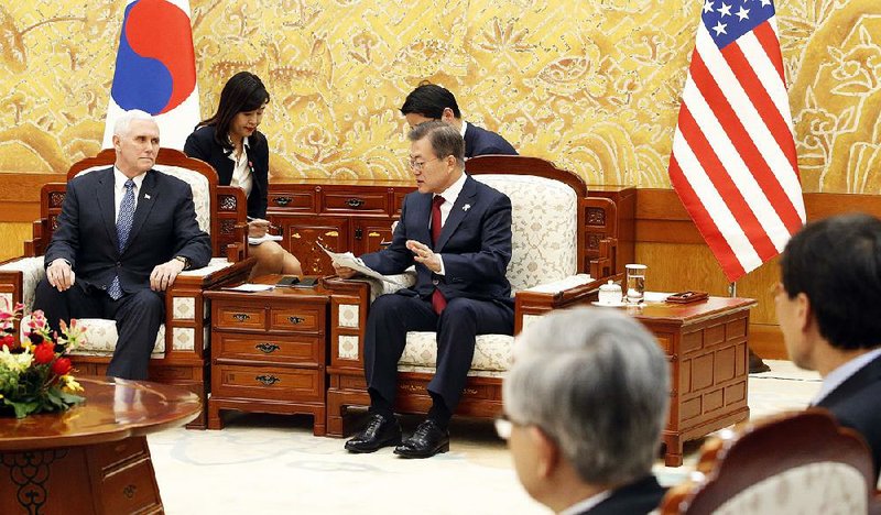 Vice President Mike Pence and South Korean President Moon Jae-in hold talks Thursday at the Blue House presidential office in Seoul. Pence declared the U.S. “resolve to stand with you is unshakable,” but officials said that in private the vice president expressed concern to Moon about his more conciliatory tone toward North Korea. 