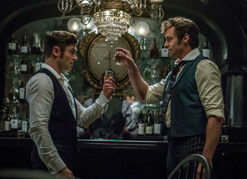 Zac Efron (left) plays Philip Carlisle and Hugh Jackman is P.T. Barnum in 20th Century Fox’s The Greatest Showman. It came in fourth at last weekend’s box office and made about $7.7 million.